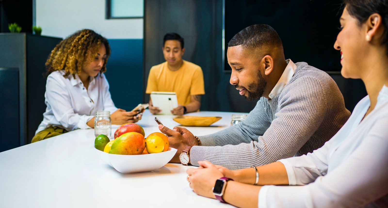 group-of-people-sitting-beside-table-2422295